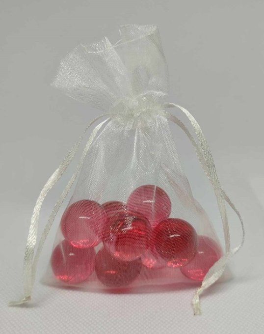 9 perles de bain ronde parfum passion dans un sachet organza