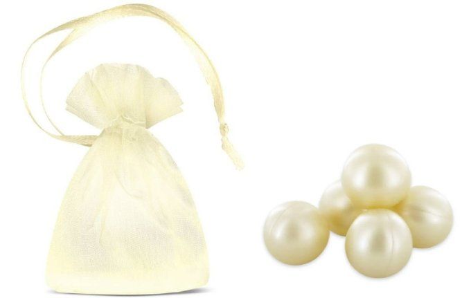 9 perles de bain ronde parfum coco dans un sachet organza