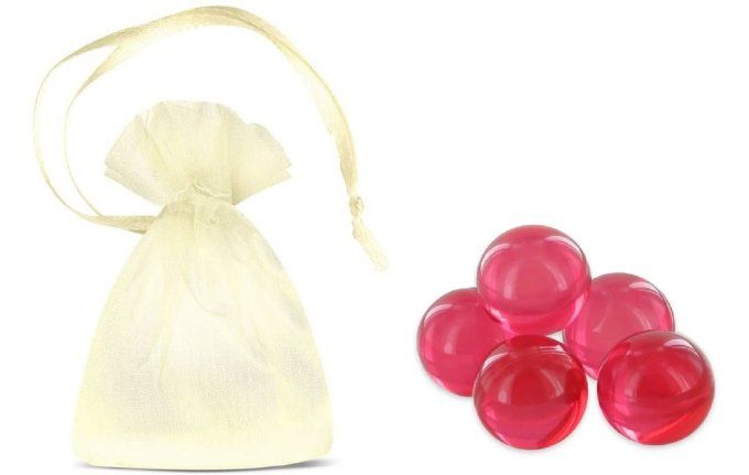 9 perles de bain ronde parfum passion dans un sachet organza